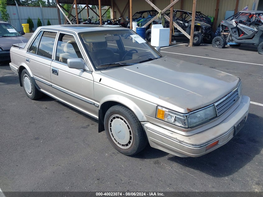 1987 Nissan Maxima VIN: JN1HU11P7HX874683 Lot: 40023074