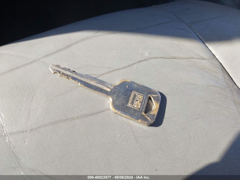 2004 Chevrolet Tracker Lt VIN: 2CNBJ634346910631 Lot: 40023577