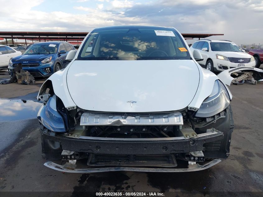 2023 Tesla Model Y Awd/Long Range Dual Motor All-Wheel Drive VIN: 7SAYGDEE3PF792623 Lot: 40023635