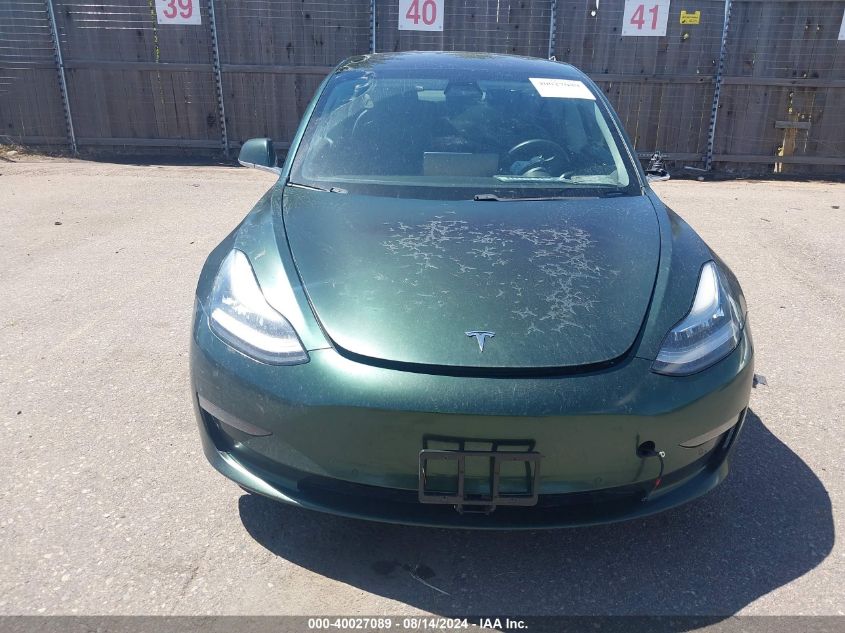 2018 Tesla Model 3 Long Range/Performance VIN: 5YJ3E1EB0JF084063 Lot: 40027089