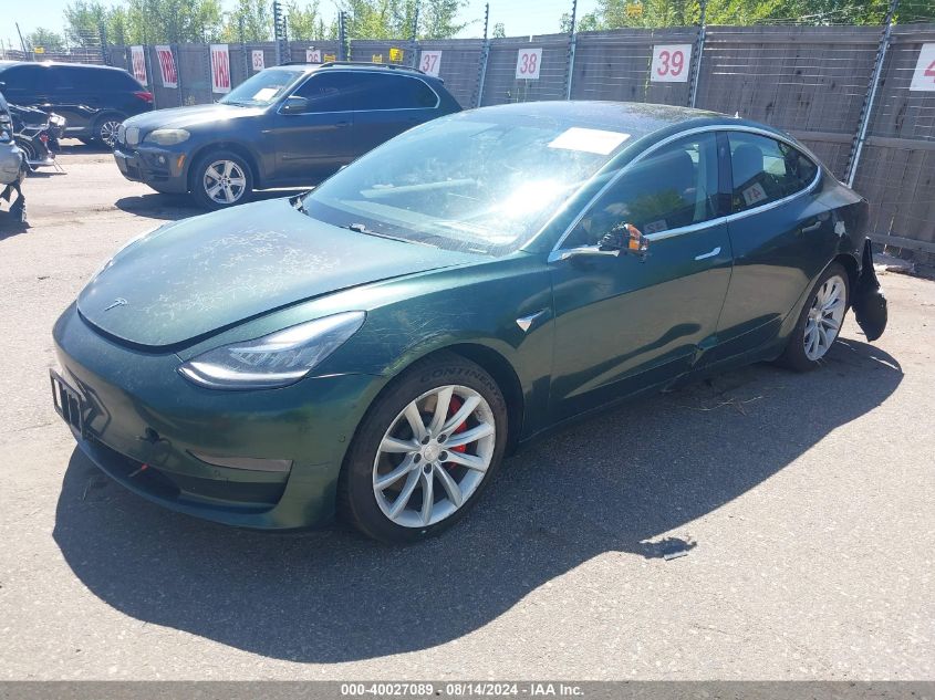 2018 Tesla Model 3 Long Range/Performance VIN: 5YJ3E1EB0JF084063 Lot: 40027089