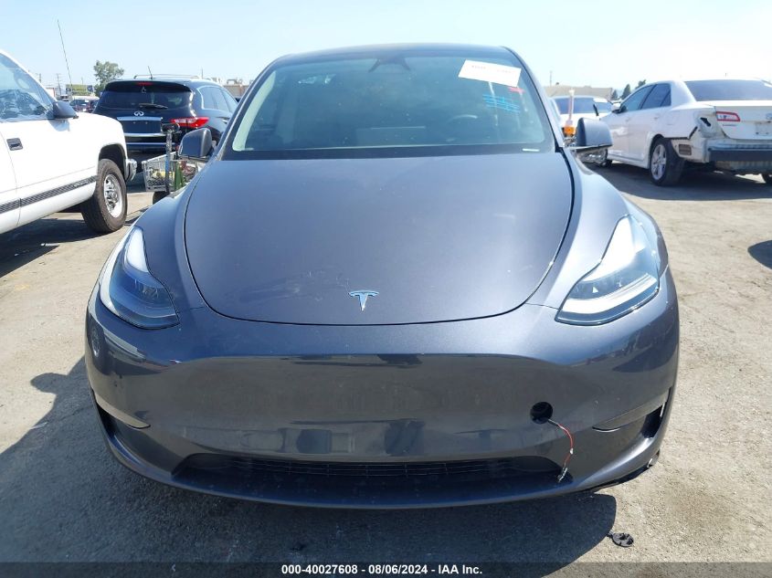 2023 Tesla Model Y Awd/Long Range Dual Motor All-Wheel Drive VIN: 7SAYGDEE8PF886481 Lot: 40027608