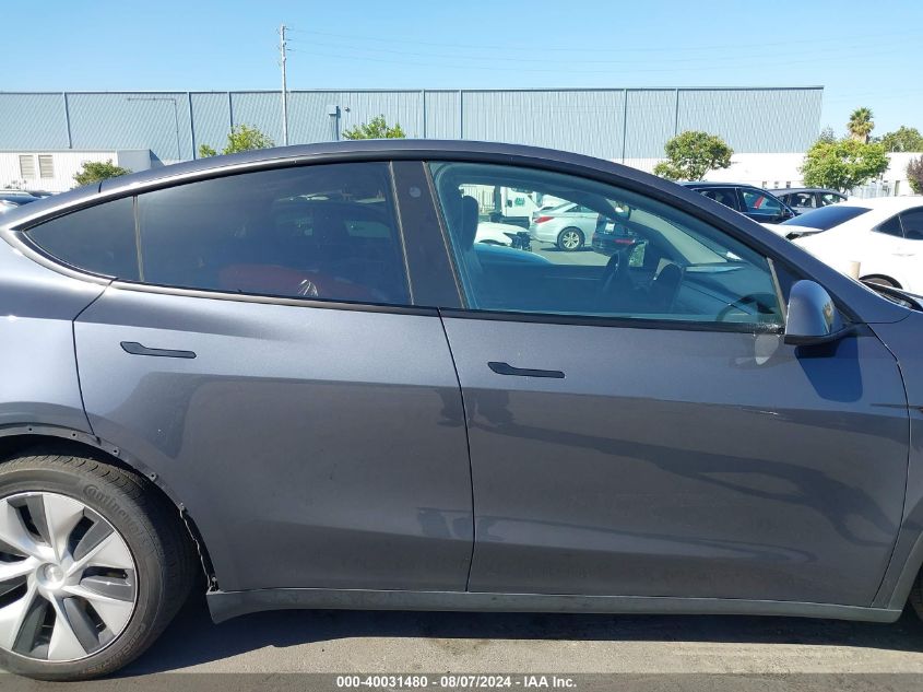 2023 Tesla Model Y Awd/Long Range Dual Motor All-Wheel Drive VIN: 7SAYGAEE9PF738841 Lot: 40031480