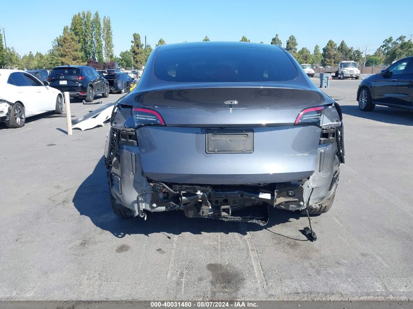 2023 Tesla Model Y Awd/Long Range Dual Motor All-Wheel Drive VIN: 7SAYGAEE9PF738841 Lot: 40031480