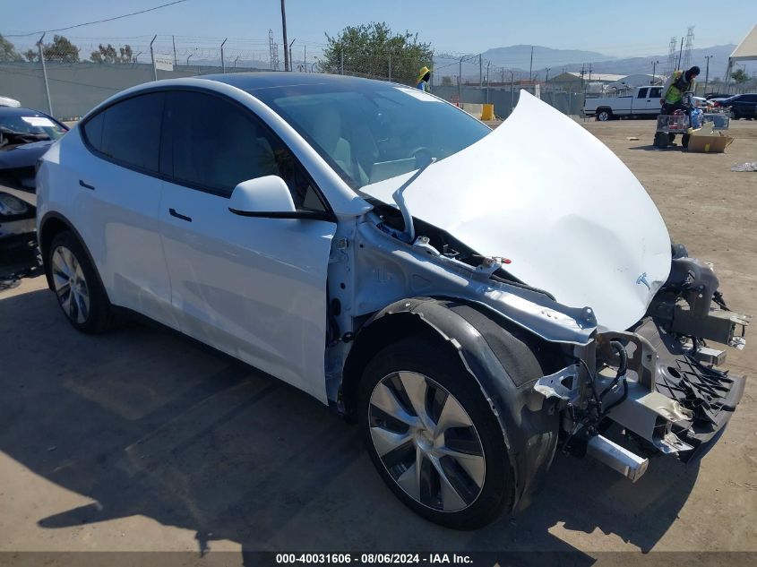 2023 Tesla Model Y Awd/Long Range Dual Motor All-Wheel Drive VIN: 7SAYGDEE3PF839990 Lot: 40031606