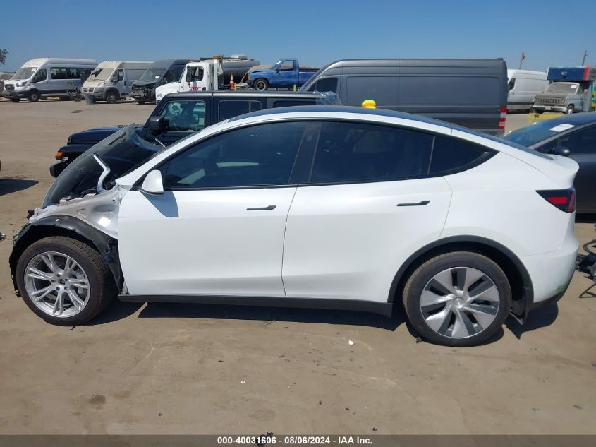 2023 Tesla Model Y Awd/Long Range Dual Motor All-Wheel Drive VIN: 7SAYGDEE3PF839990 Lot: 40031606