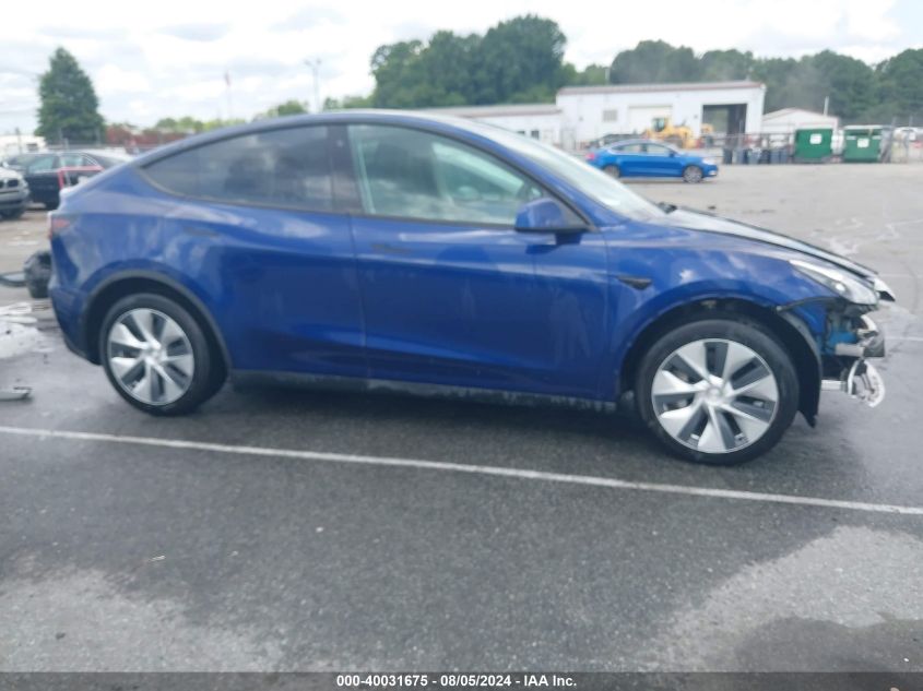 2023 Tesla Model Y Awd/Long Range Dual Motor All-Wheel Drive VIN: 7SAYGAEE0PF616305 Lot: 40031675