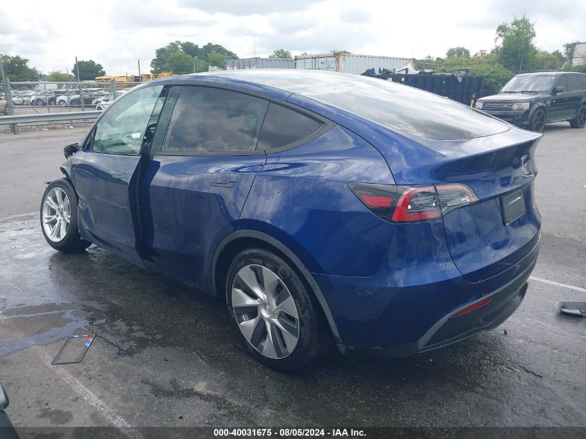 2023 Tesla Model Y Awd/Long Range Dual Motor All-Wheel Drive VIN: 7SAYGAEE0PF616305 Lot: 40031675