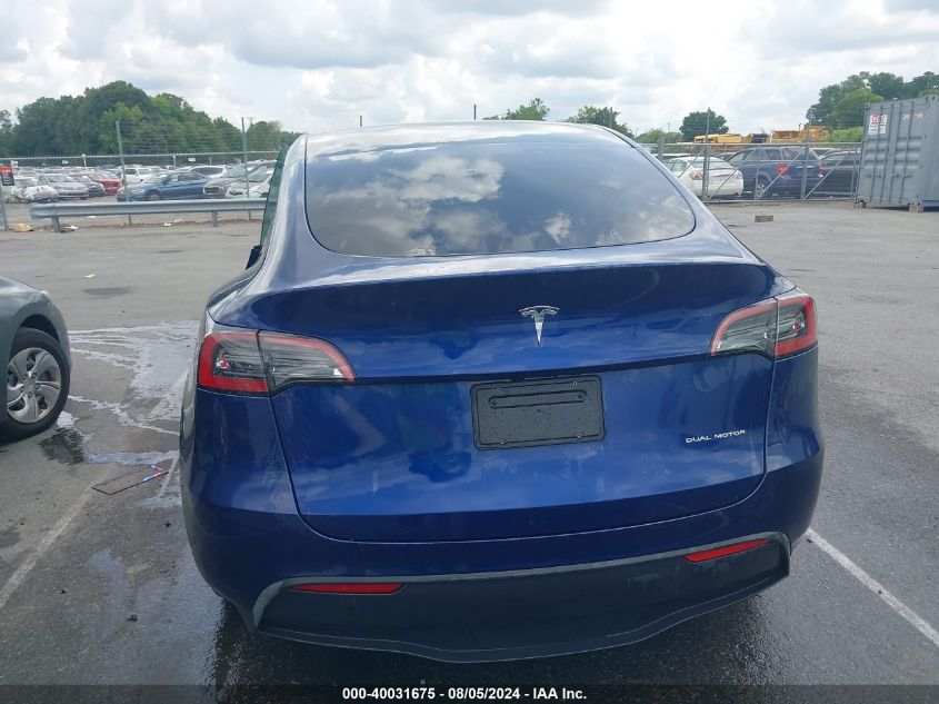 2023 Tesla Model Y Awd/Long Range Dual Motor All-Wheel Drive VIN: 7SAYGAEE0PF616305 Lot: 40031675