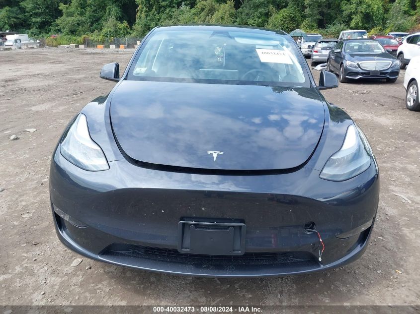 2024 Tesla Model Y Long Range Dual Motor All-Wheel Drive VIN: 7SAYGDEE7RA231597 Lot: 40032473