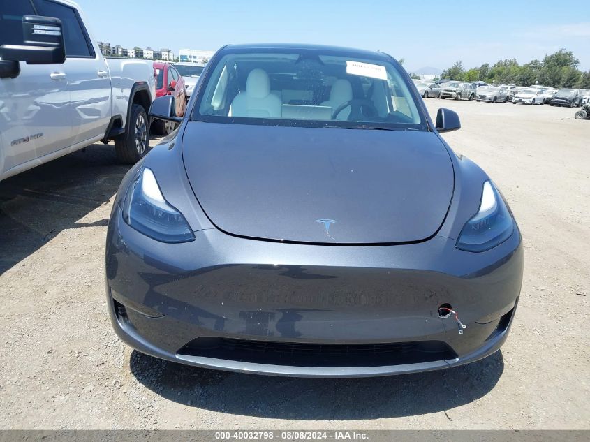 2023 Tesla Model Y Awd/Long Range Dual Motor All-Wheel Drive VIN: 7SAYGAEE1PF847715 Lot: 40032798