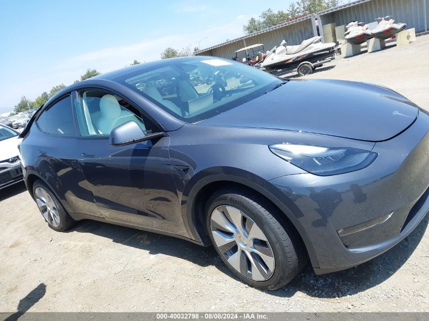 2023 Tesla Model Y Awd/Long Range Dual Motor All-Wheel Drive VIN: 7SAYGAEE1PF847715 Lot: 40032798