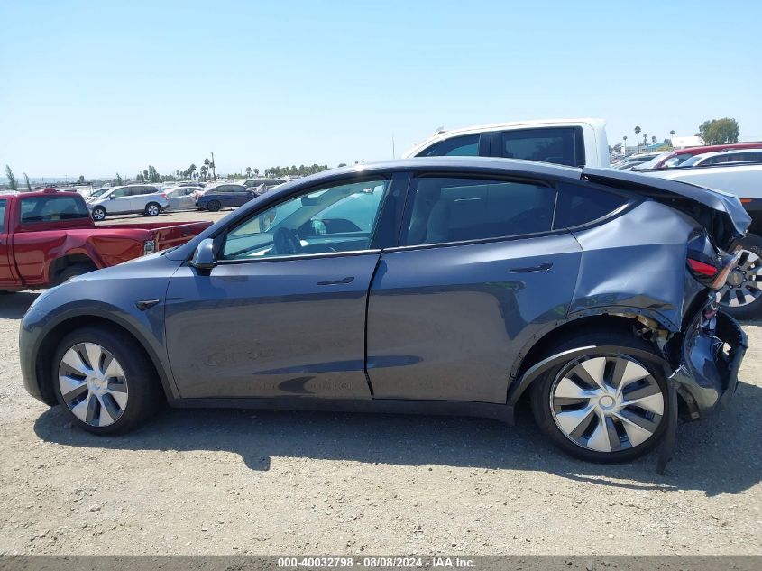 2023 Tesla Model Y Awd/Long Range Dual Motor All-Wheel Drive VIN: 7SAYGAEE1PF847715 Lot: 40032798