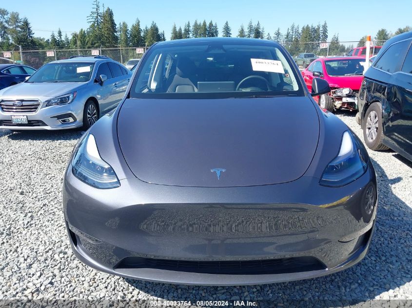 2023 Tesla Model Y Awd/Long Range Dual Motor All-Wheel Drive VIN: 7SAYGDEE2PF882359 Lot: 40033764