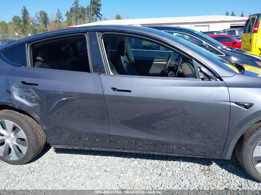 2023 Tesla Model Y Awd/Long Range Dual Motor All-Wheel Drive VIN: 7SAYGDEE2PF882359 Lot: 40033764