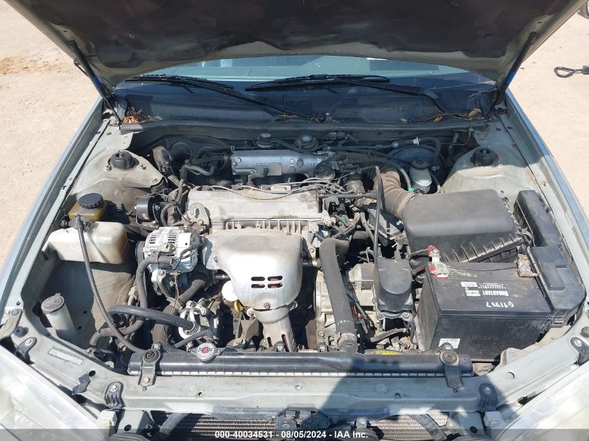 2000 Toyota Camry Le VIN: JT2BG22K7Y0500076 Lot: 40034531