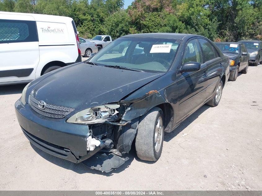 2004 Toyota Camry Le VIN: JTDBE32K840272084 Lot: 40035100