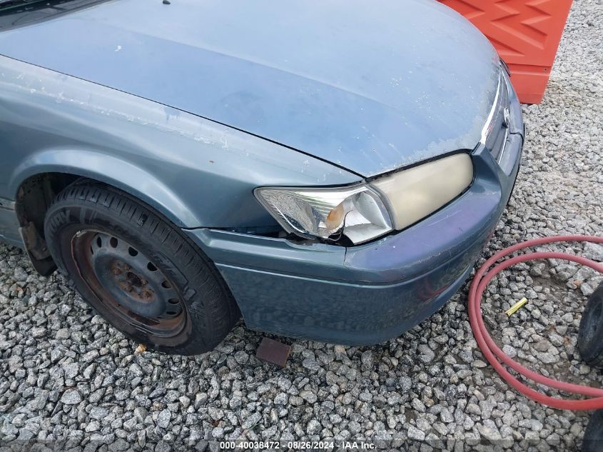 2000 Toyota Camry Le VIN: JT2BG22KXY0471253 Lot: 40038472