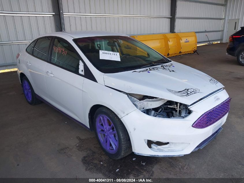 VIN 1FADP3F29HL288544 2017 FORD FOCUS no.1