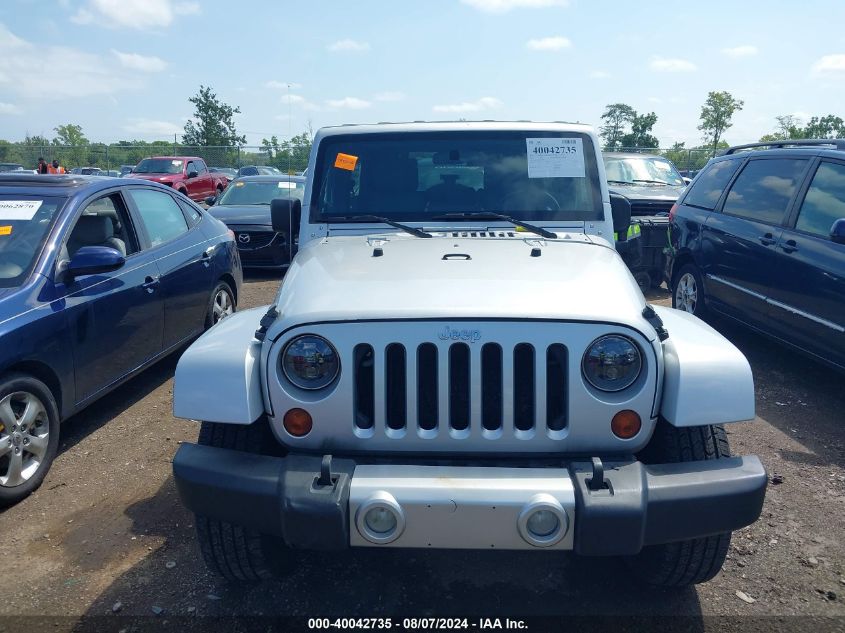 2009 Jeep Wrangler Unlimited Sahara VIN: 1J4GA59199L765895 Lot: 40042735