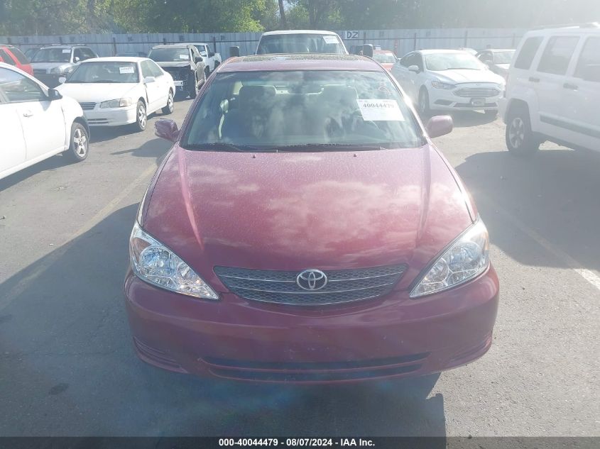 2003 Toyota Camry Le V6 VIN: 4T1BF30K13U038999 Lot: 40044479