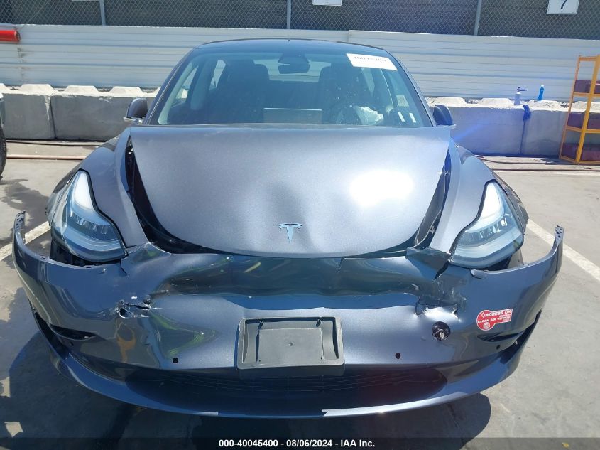 2018 Tesla Model 3 Long Range/Mid Range VIN: 5YJ3E1EA7JF025633 Lot: 40045400