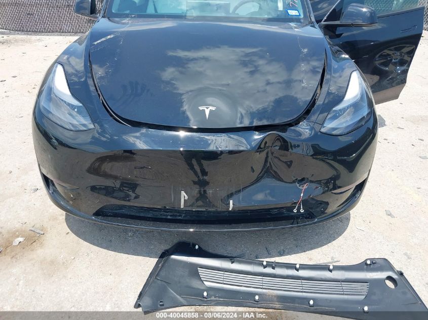 2023 Tesla Model Y Awd/Long Range Dual Motor All-Wheel Drive VIN: 7SAYGAEE7PF774981 Lot: 40045858