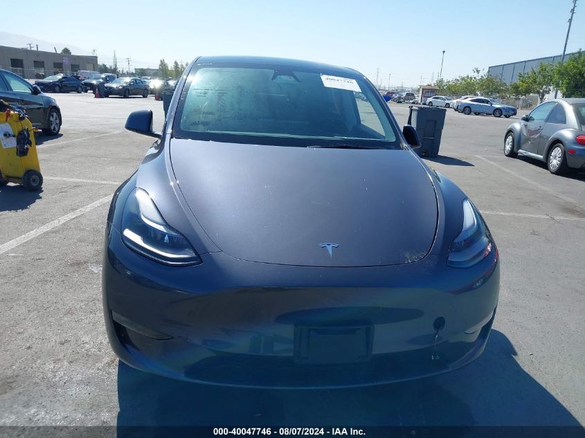 2023 Tesla Model Y Awd/Long Range Dual Motor All-Wheel Drive VIN: 7SAYGDEE3PF964181 Lot: 40047746