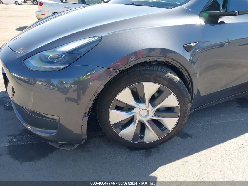 2023 Tesla Model Y Awd/Long Range Dual Motor All-Wheel Drive VIN: 7SAYGDEE3PF964181 Lot: 40047746