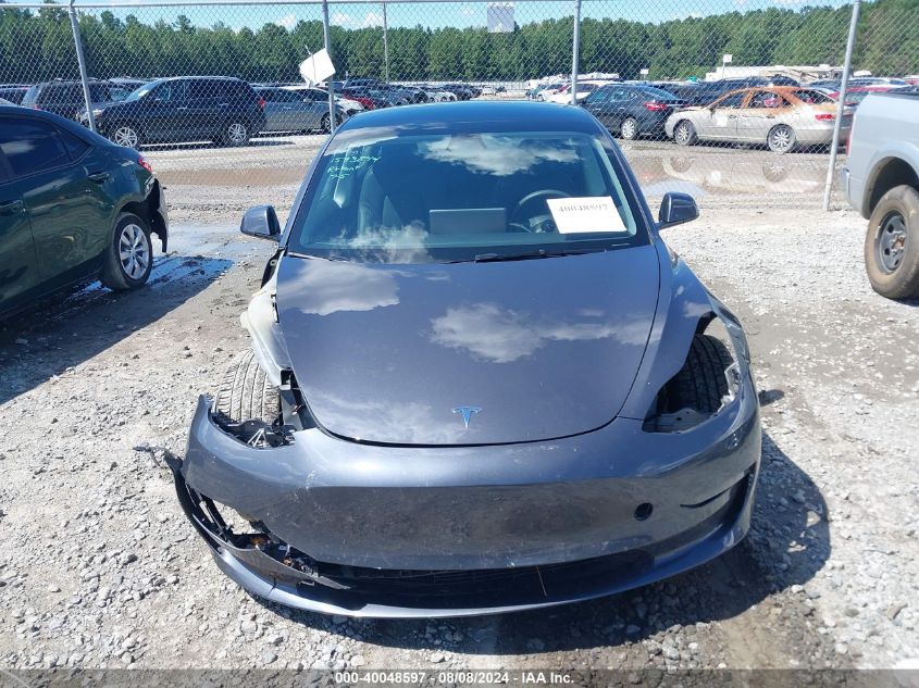 2023 Tesla Model 3 Long Range Dual Motor All-Wheel Drive VIN: 5YJ3E1EB5PF677393 Lot: 40048597