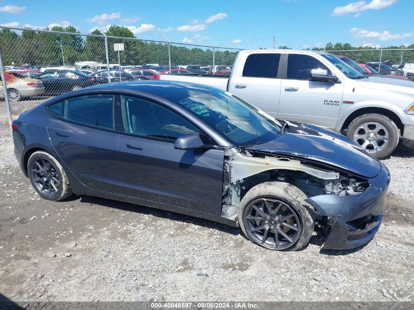 2023 Tesla Model 3 Long Range Dual Motor All-Wheel Drive VIN: 5YJ3E1EB5PF677393 Lot: 40048597