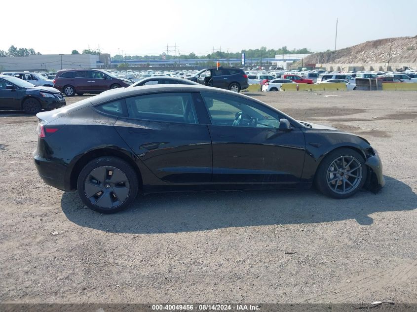 2023 Tesla Model 3 Long Range Dual Motor All-Wheel Drive VIN: 5YJ3E1EB0PF689080 Lot: 40049456