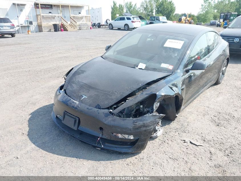 2023 Tesla Model 3 Long Range Dual Motor All-Wheel Drive VIN: 5YJ3E1EB0PF689080 Lot: 40049456