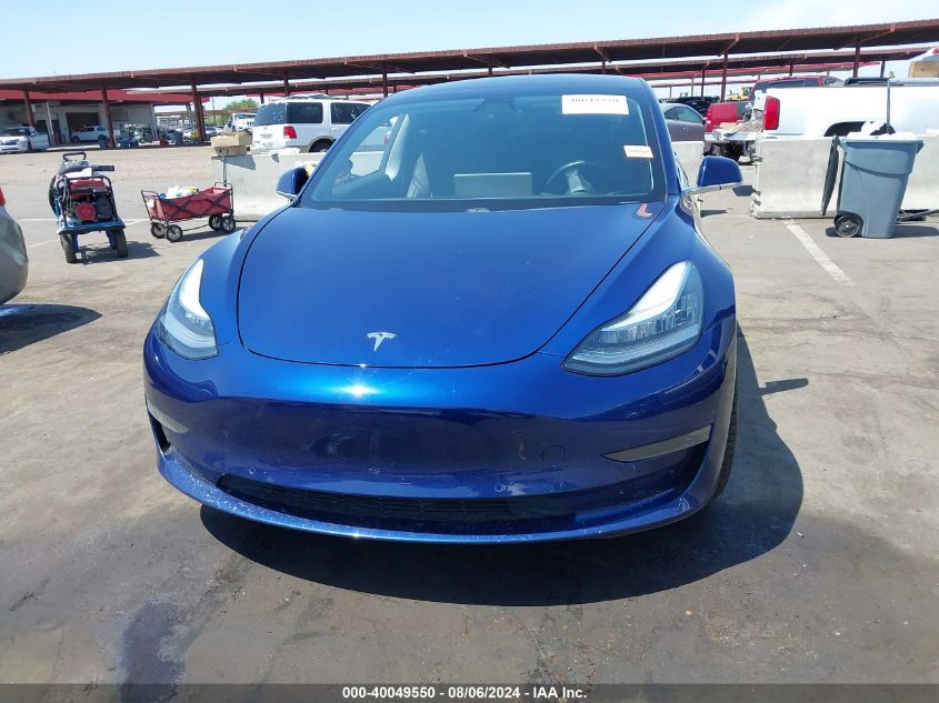 2018 Tesla Model 3 Long Range/Mid Range VIN: 5YJ3E1EA0JF109003 Lot: 40049550