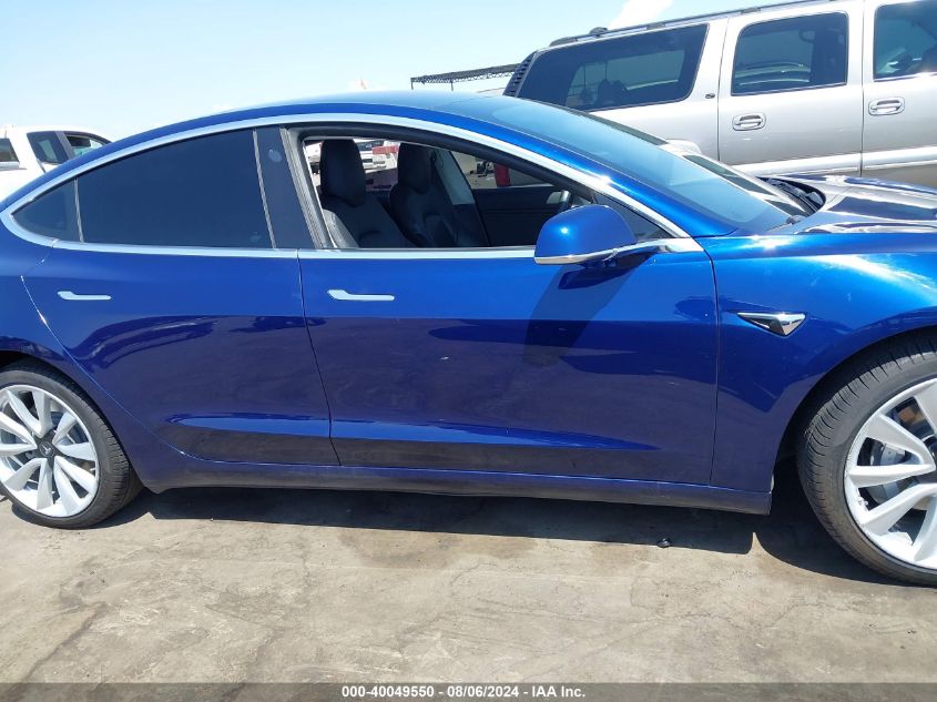 2018 Tesla Model 3 Long Range/Mid Range VIN: 5YJ3E1EA0JF109003 Lot: 40049550