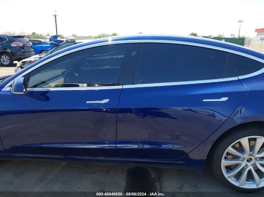 2018 Tesla Model 3 Long Range/Mid Range VIN: 5YJ3E1EA0JF109003 Lot: 40049550