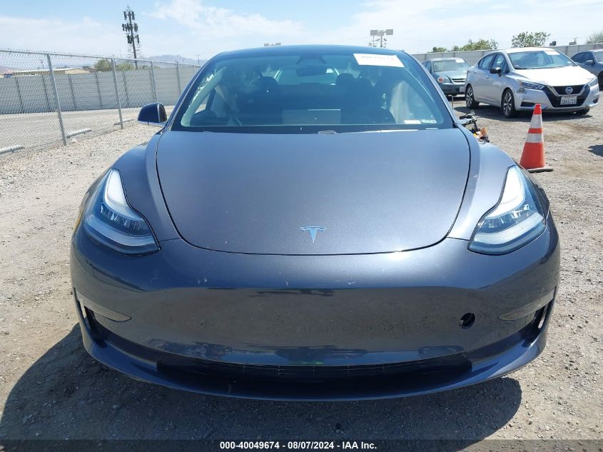 2019 Tesla Model 3 VIN: 5YJ3E1EB8KF149291 Lot: 40049674