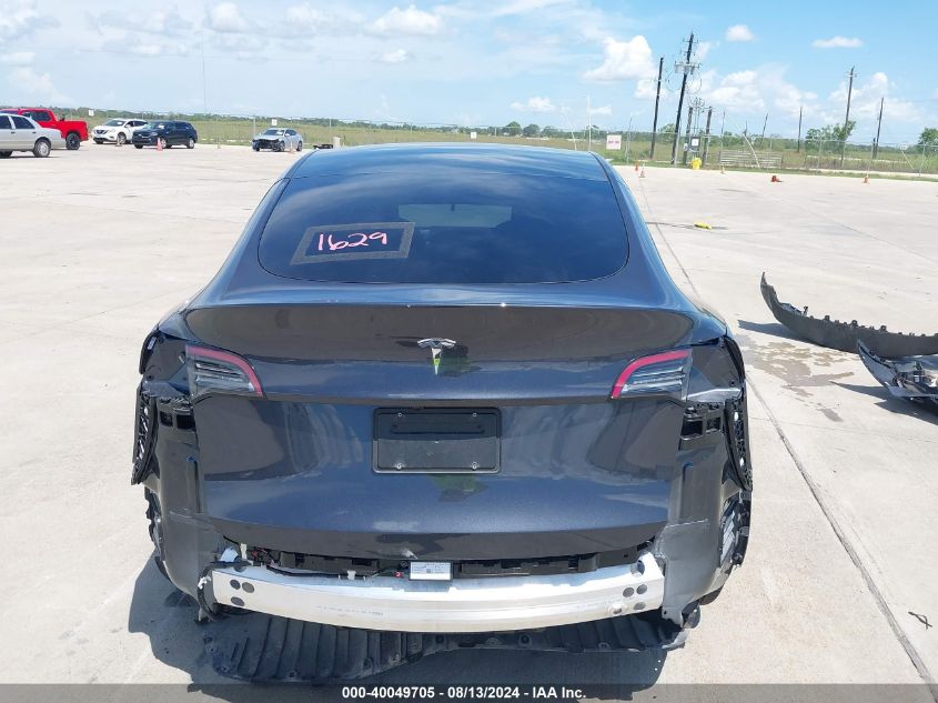 2024 Tesla Model Y Long Range/Rwd VIN: 7SAYGDED1RF052031 Lot: 40049705