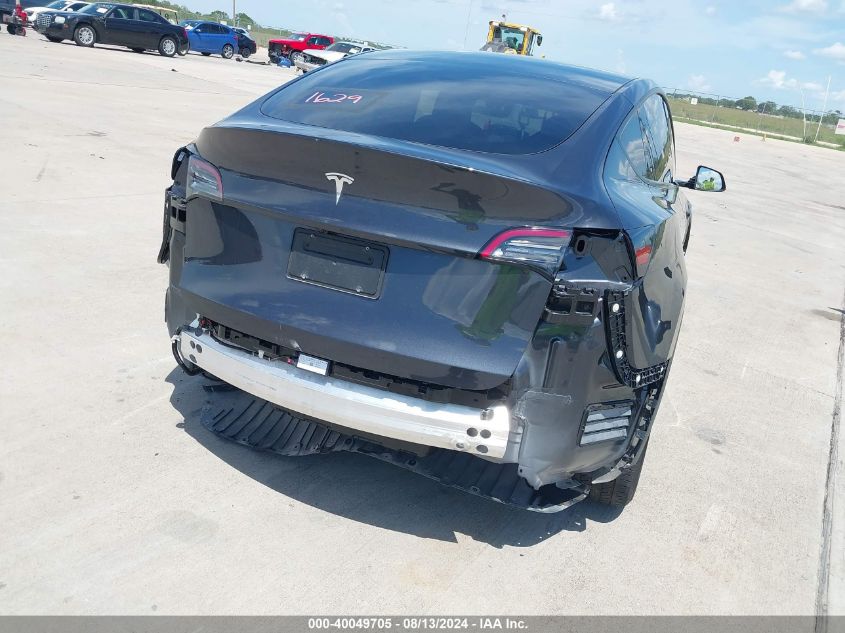 2024 Tesla Model Y Long Range/Rwd VIN: 7SAYGDED1RF052031 Lot: 40049705