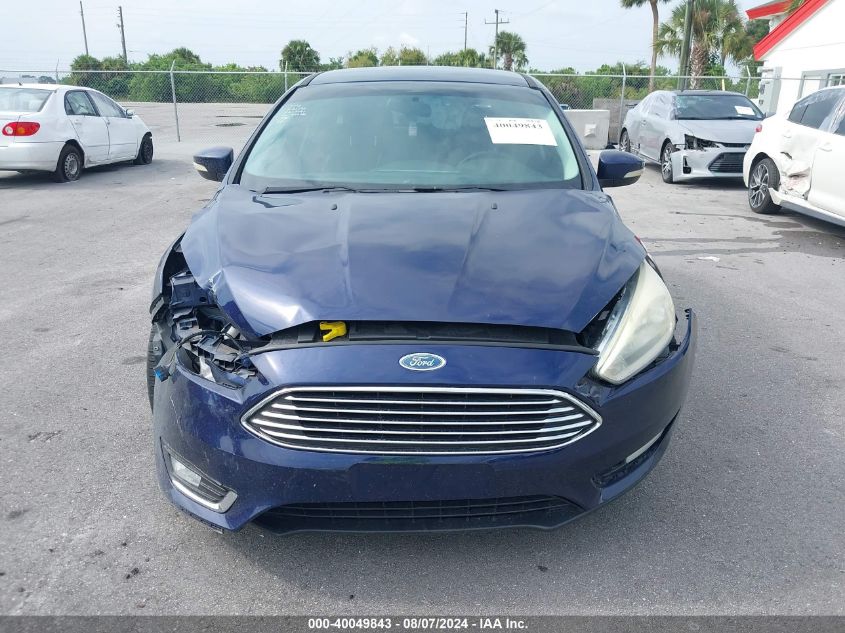 2016 Ford Focus Titanium VIN: 1FADP3N29GL242096 Lot: 40049843