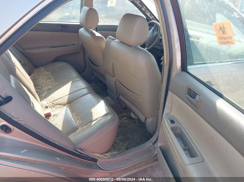 2003 Toyota Camry Le VIN: JTDBE32K230231397 Lot: 40049966