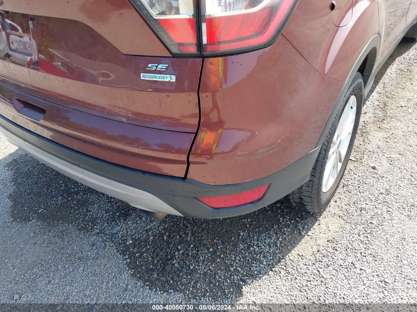 VIN 1FMCU0GD8JUC00818 2018 FORD ESCAPE SE
