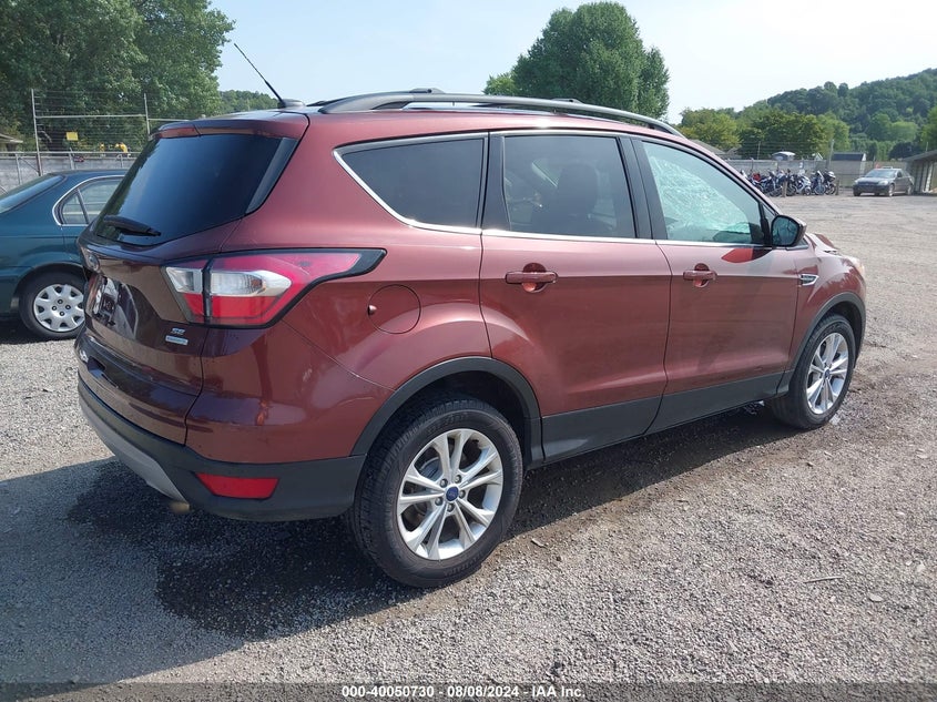 VIN 1FMCU0GD8JUC00818 2018 FORD ESCAPE SE