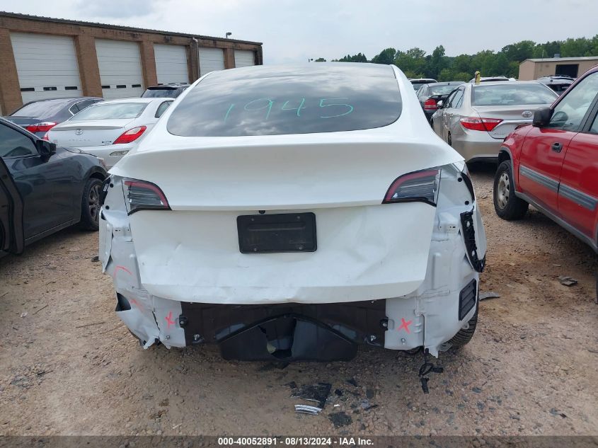 2023 Tesla Model Y Awd/Long Range Dual Motor All-Wheel Drive VIN: 7SAYGDEE1PF701087 Lot: 40052891