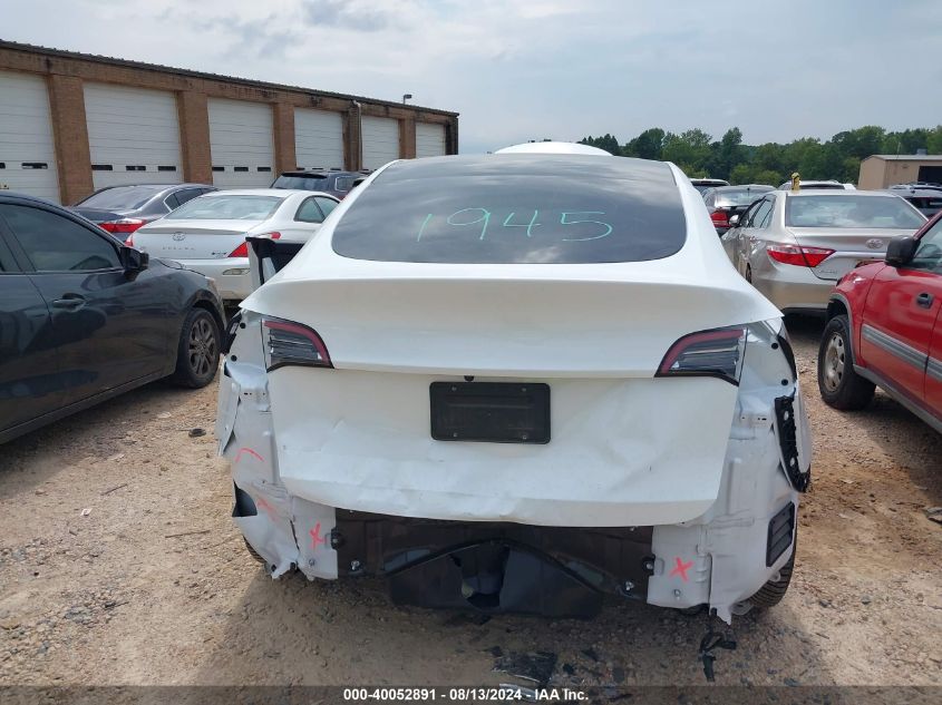 2023 Tesla Model Y Awd/Long Range Dual Motor All-Wheel Drive VIN: 7SAYGDEE1PF701087 Lot: 40052891