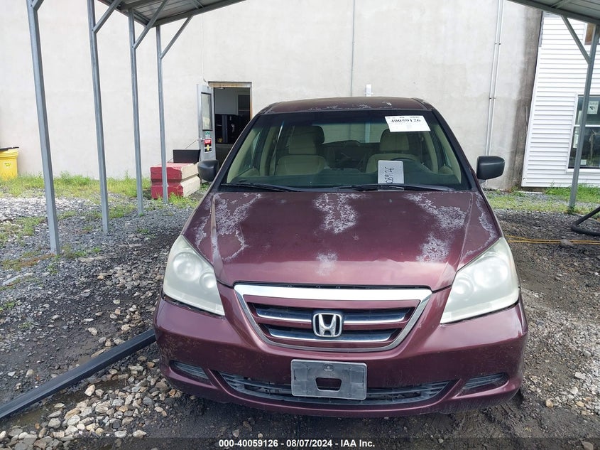 2007 Honda Odyssey Lx VIN: 5FNRL38277B039802 Lot: 40059126