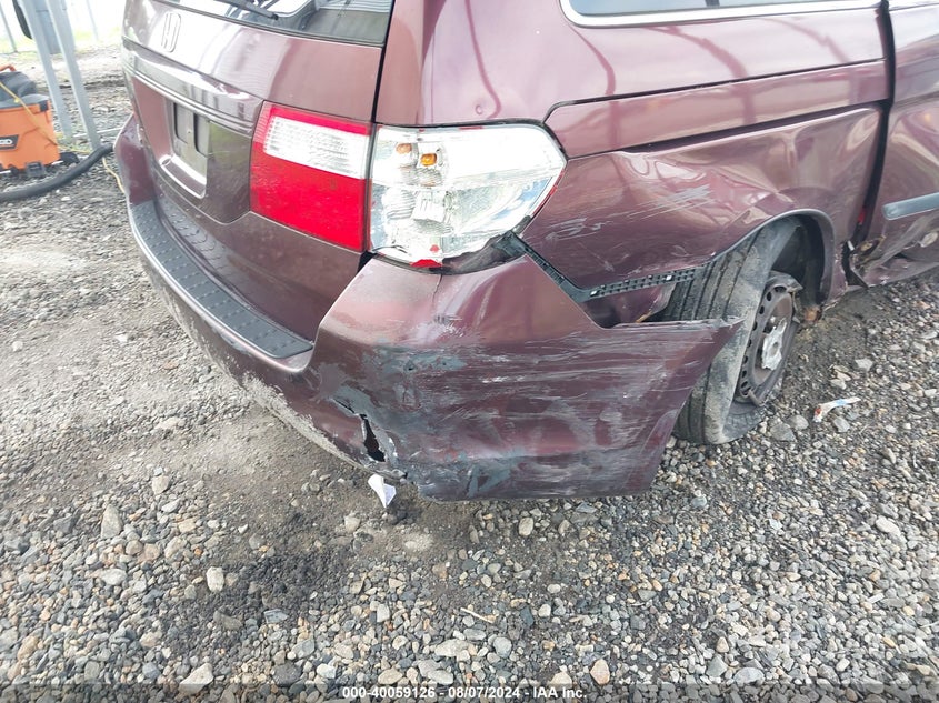 2007 Honda Odyssey Lx VIN: 5FNRL38277B039802 Lot: 40059126