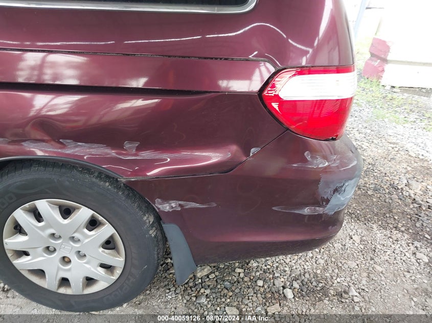 2007 Honda Odyssey Lx VIN: 5FNRL38277B039802 Lot: 40059126