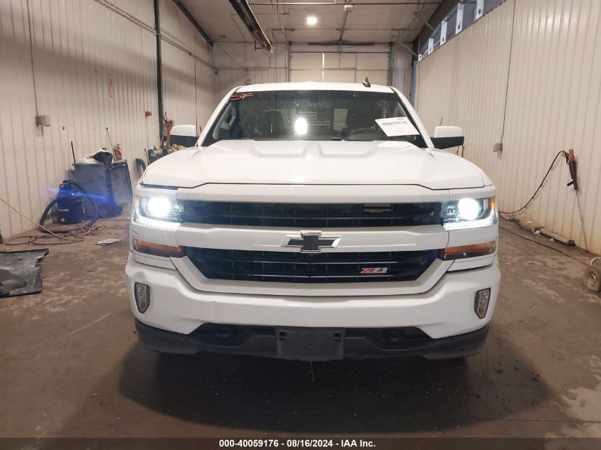 2018 Chevrolet Silverado 1500 2Lt VIN: 3GCUKREC9JG590716 Lot: 40059176