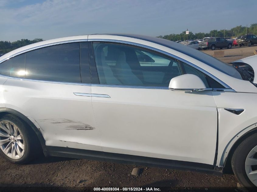 2020 Tesla Model X Long Range Dual Motor All-Wheel Drive/Long Range Plus Dual Motor All-Wheel Drive VIN: 5YJXCDE24LF242609 Lot: 40059304